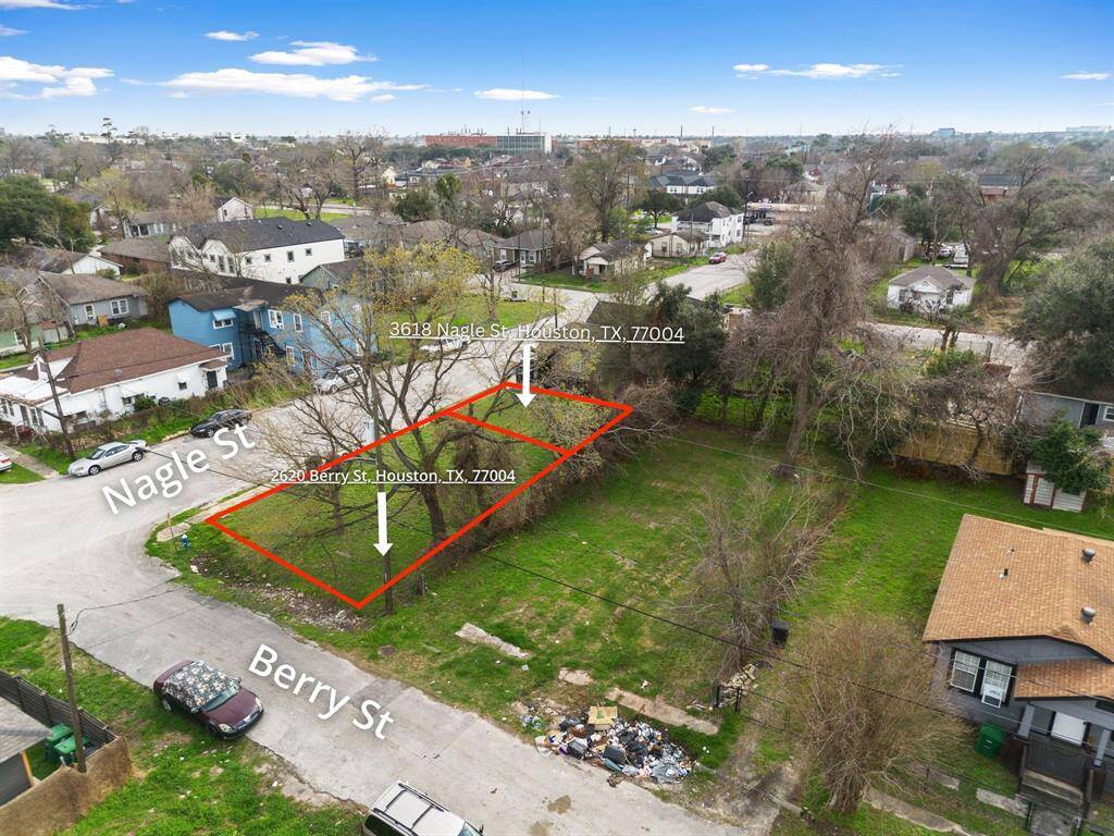 This closer aerial perspective showcases the lot’s even terrain and direct street access, providing a clear vision for builders and investors looking to move forward with construction plans.