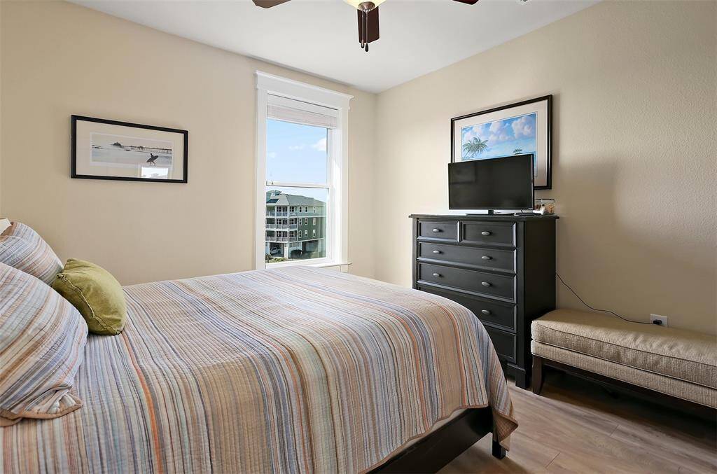 Thoughtfully designed with ample space, natural light, and stylish furnishings, this inviting bedroom is perfect for guests or family members.