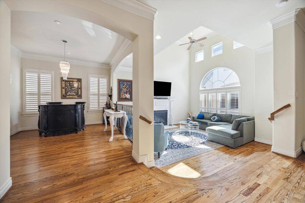 Open floor plan with high ceilings and wood floors!