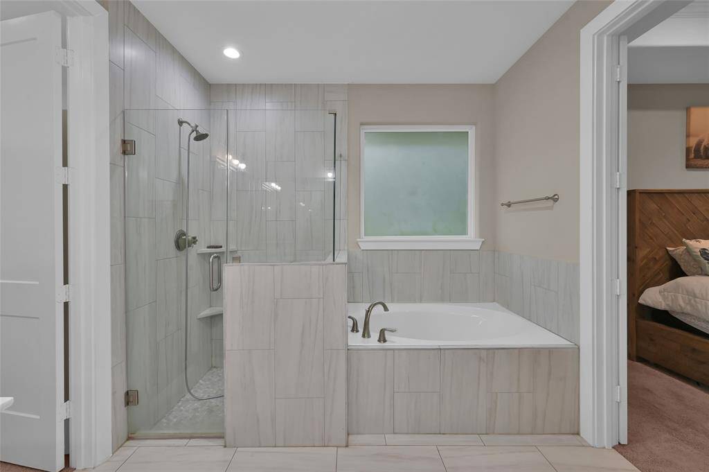 Relax and unwind in this beautiful primary bathroom.