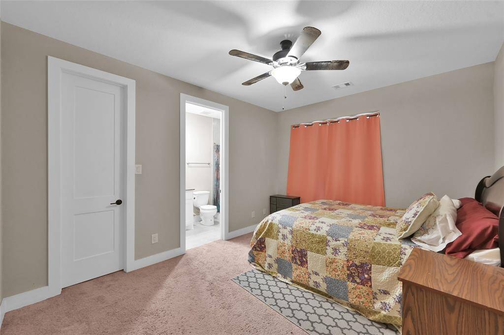 Discover the comfort of this secondary bedroom, complete with a private bathroom.