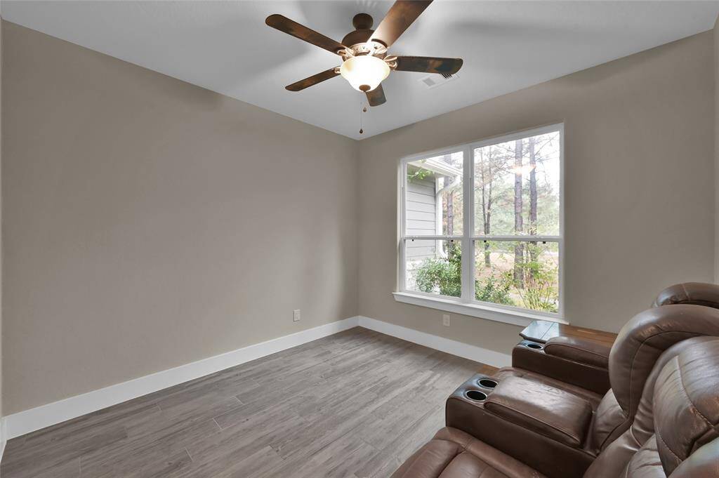 Versatile bonus space ideal for a home office or media room.