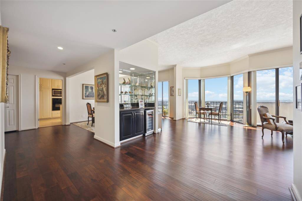 Gorgeous views of wrap around patio and city from the lopen living area