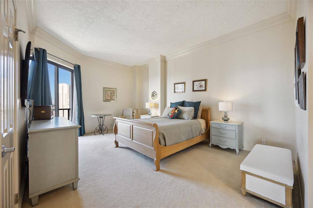 Primary bedroom is a luxurious retreat featuring a spacious layout