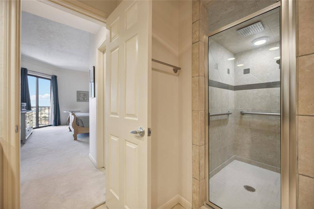 Stand alone shower with rainfall fixture