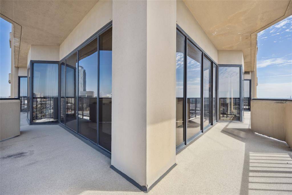 The balcony offers a peaceful retreat from the hustle and bustle of daily life below