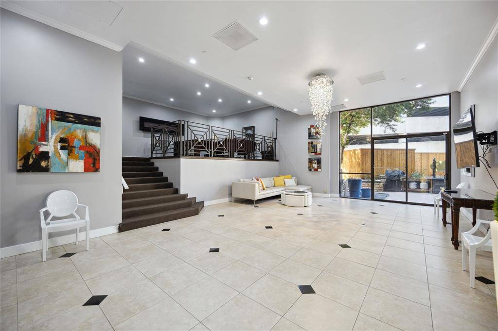 Event space that can be reserved for gatherings includes full kitchen and sliding doors out to pool deck