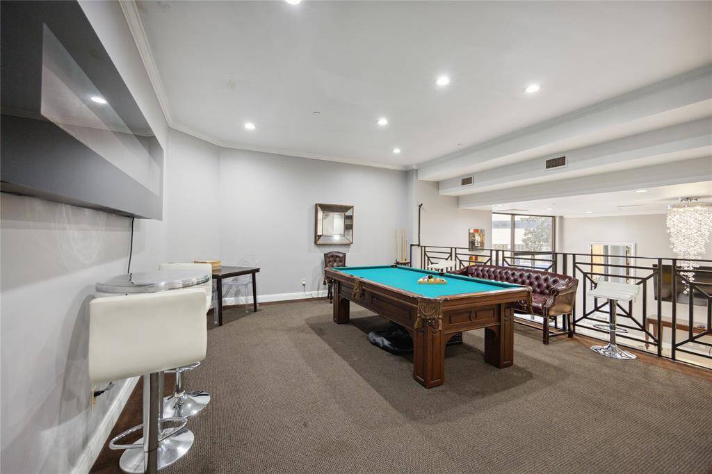 Enjoy the billiard table and modern fireplace
