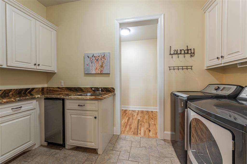 laundry room with more storage