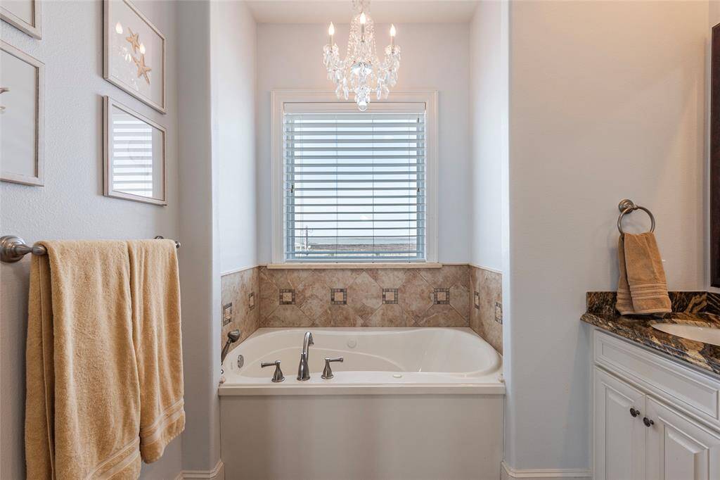 nice soaking tub in primary bathroom
