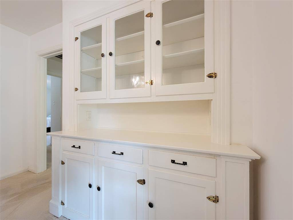 Charming and functional formal dining built in china hutch.