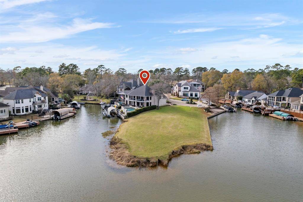 This waterfront haven offers a lifestyle brimming with relaxation and adventure. Wake up to serene marina cove views of Lake Conroe.