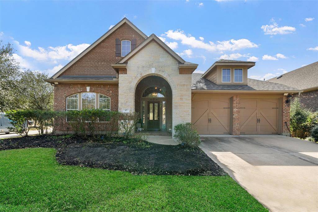 Welcome Home! 47 Driftdale Place is waiting for you! This three-bedroom, three-bathroom home with a spacious game room features both a side and back patio perfect for relaxing or entertaining.