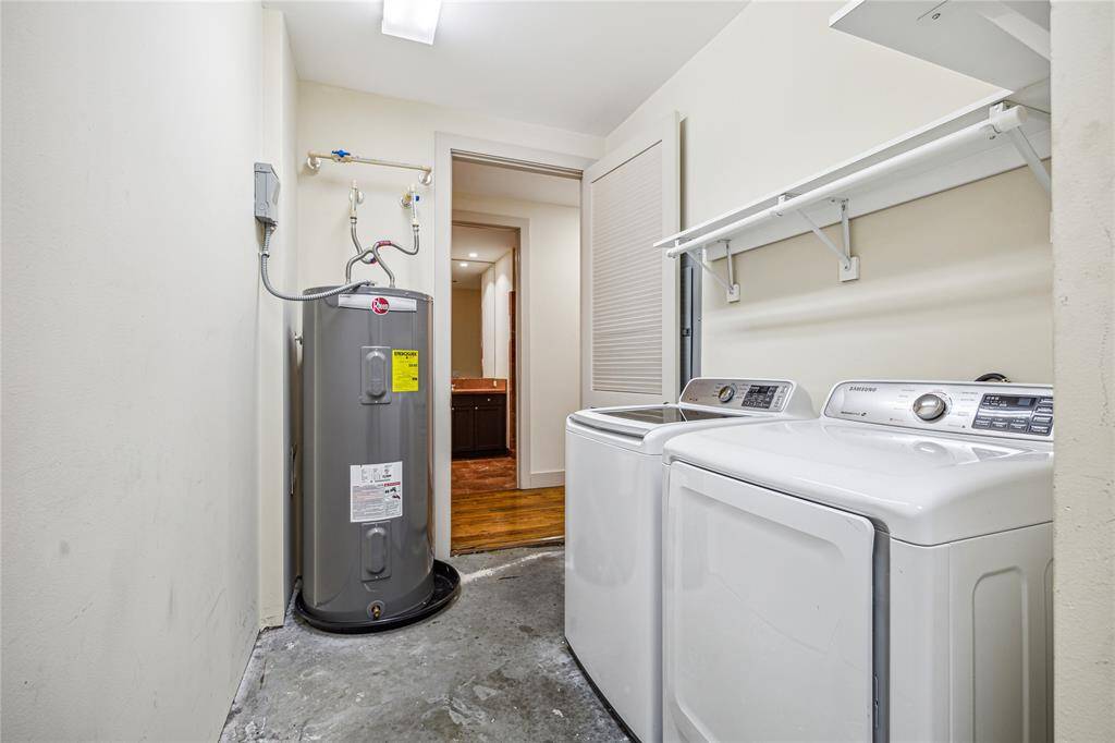 The Laundry Room with hanging space and shelves for storage.