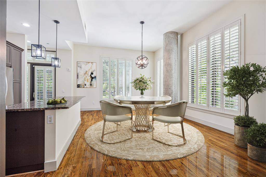 Enjoy this open space adjacent to the Cook's Kitchen as a Dining area or expand the Living Room with an additional seating area. (virtually staged)