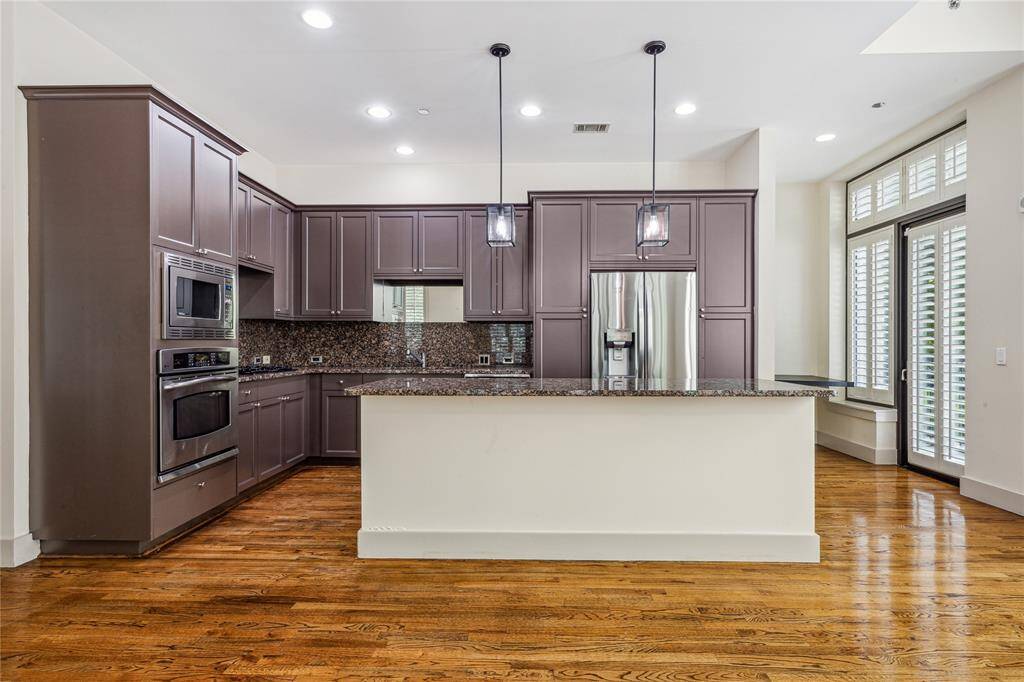 Fantastic Kitchen tucked away from the Living Room. A separate balcony serves this area.