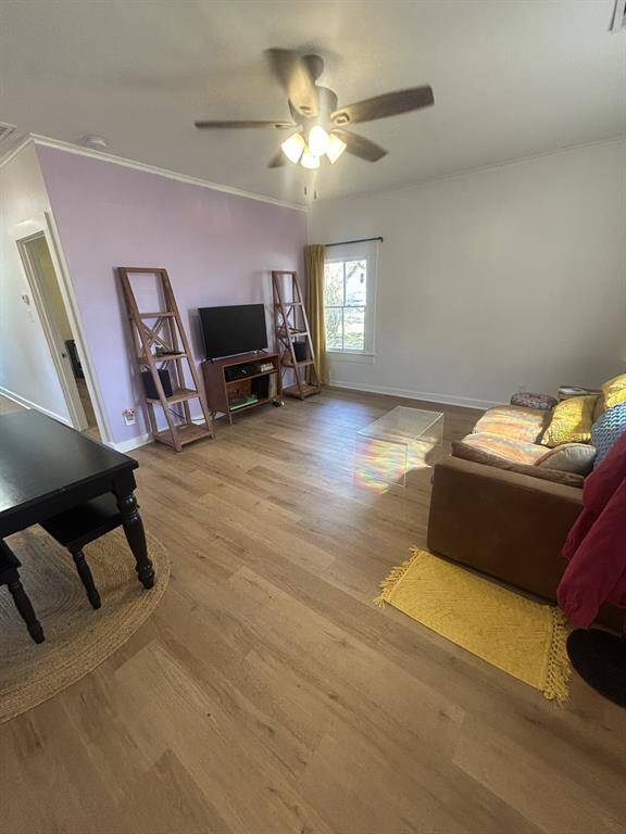 Front living room has room for dining. Lots of light.