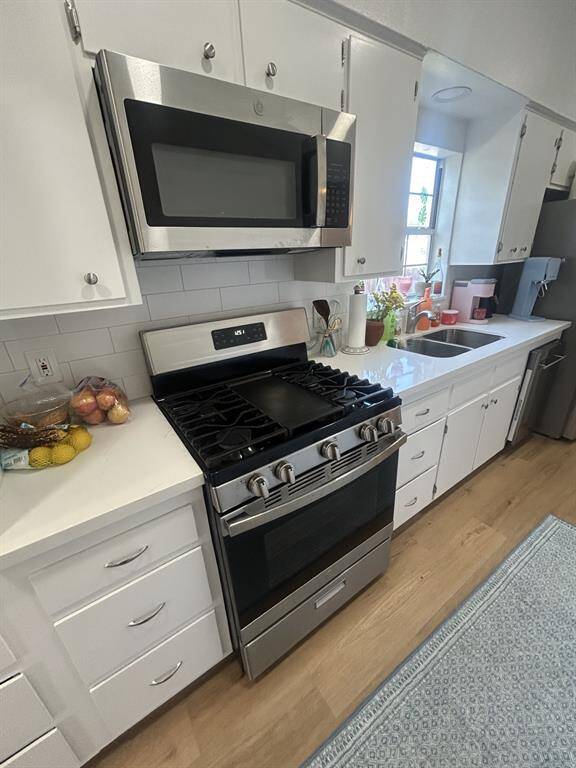 Gas range and microwave.