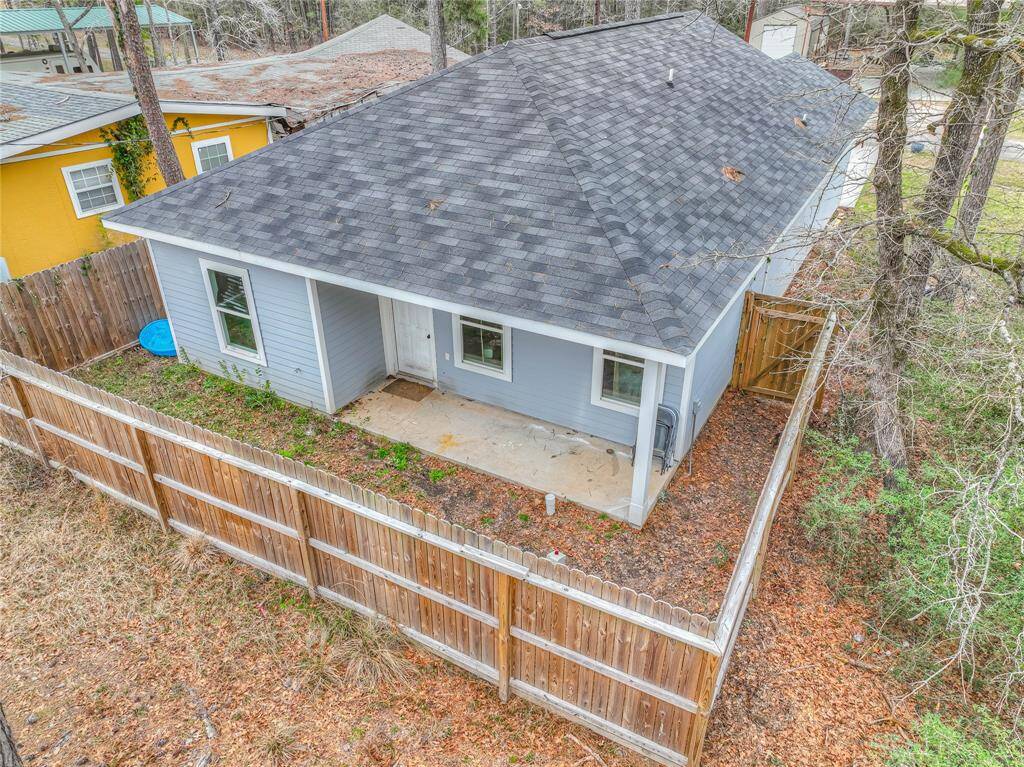 Back view, fence back yard, covered porch
