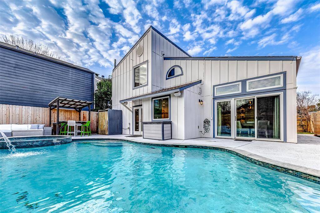 Dive into luxury with this sparkling pool, offering seamless indoor-outdoor access.