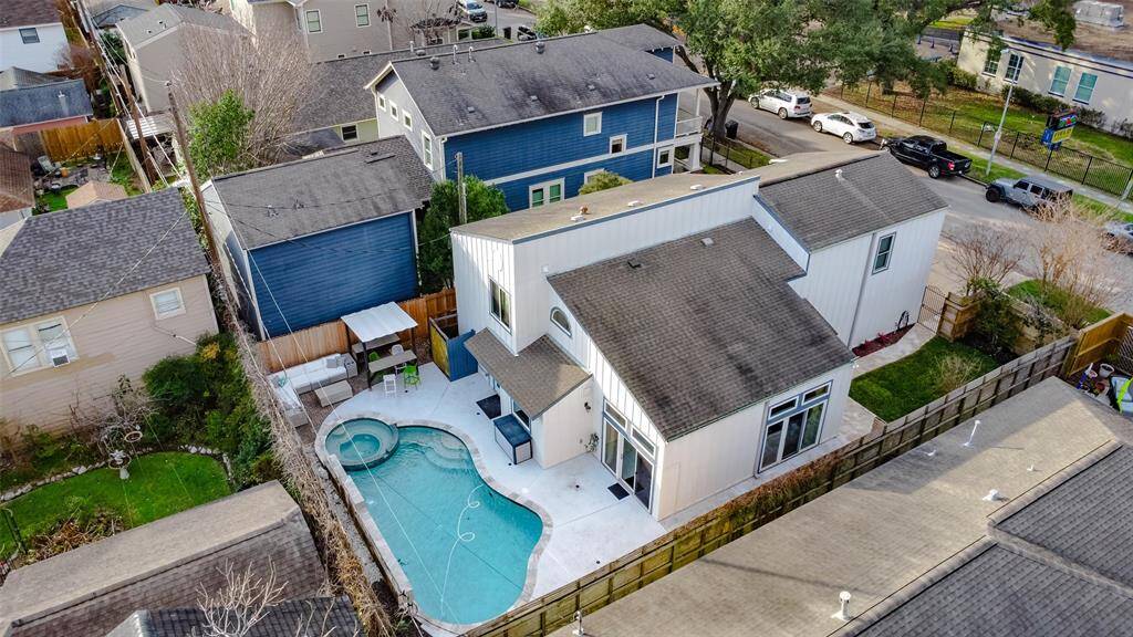 This inviting home features a pool and a fully-fenced grassy courtyard, perfect for relaxation and privacy. Across from Field Elementary.