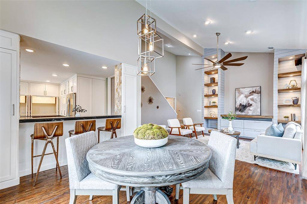 Experience seamless entertaining with the open-concept living and dining area flowing into the kitchen.