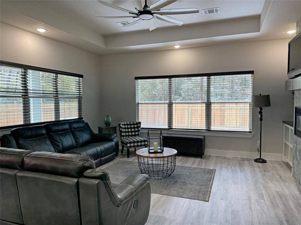 Living room with an abundance of natural lighting.