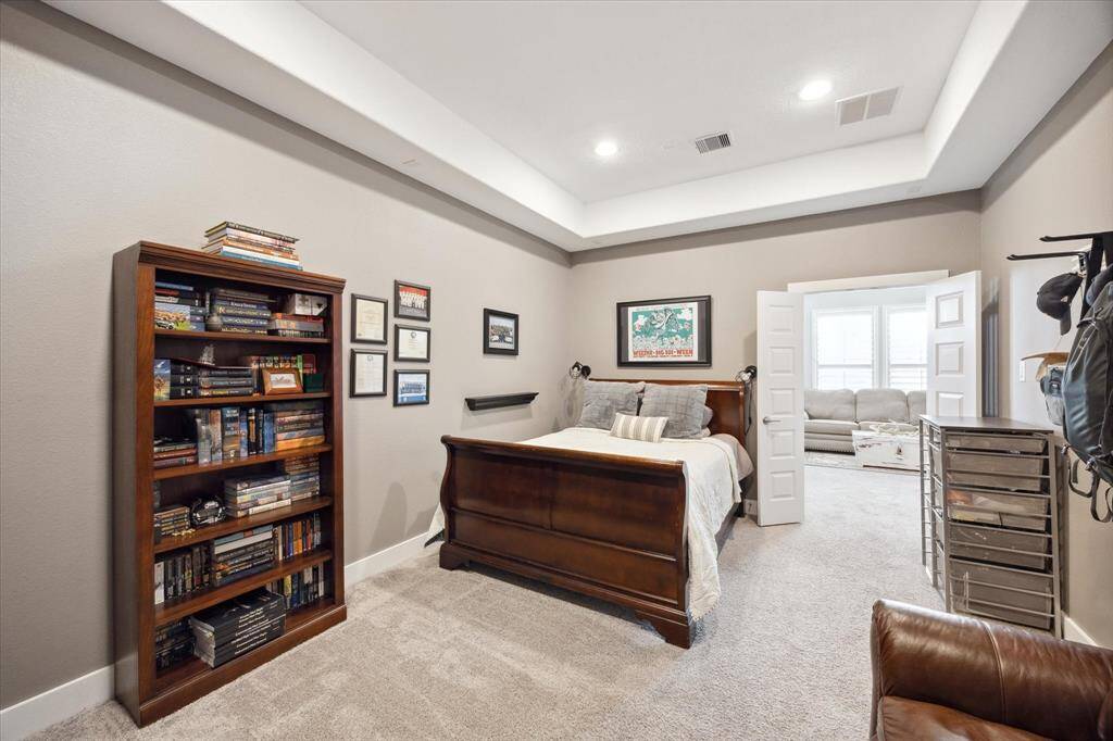 This versatile upstairs room, currently a bedroom, was originally designed as a media room.