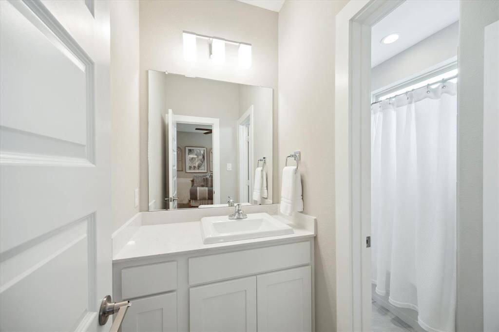 Upstairs, a convenient Hollywood bath connects bedrooms 3 and 4.