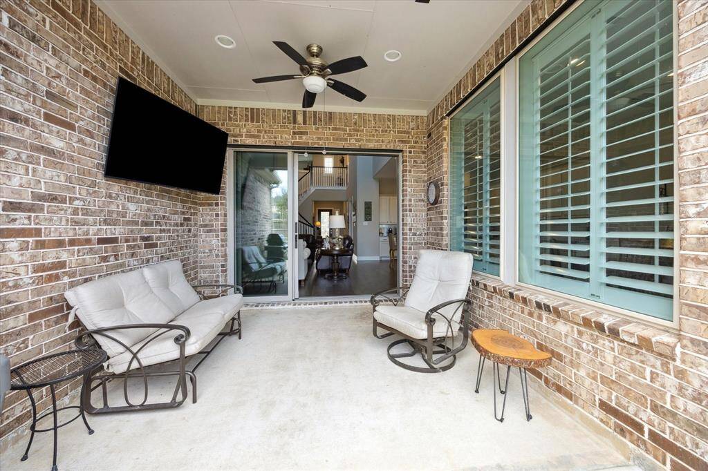 Experience seamless indoor-outdoor living with this inviting patio.