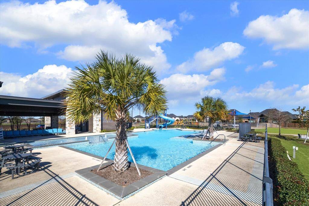 Enjoy a refreshing escape at the community pool.