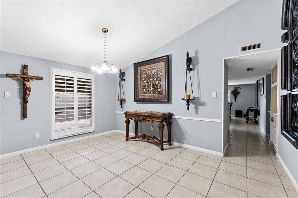 Step inside to an inviting open-concept living space with fresh paint, modern finishes, and no carpet for easy maintenance.