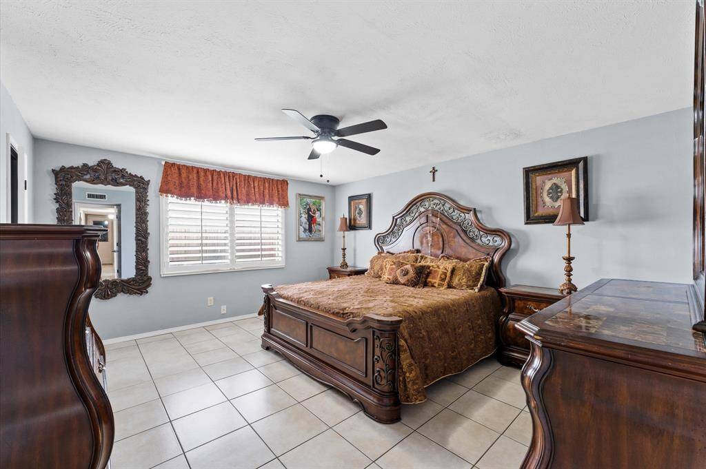 Bright, spacious bedroom with new windows and fresh paint.