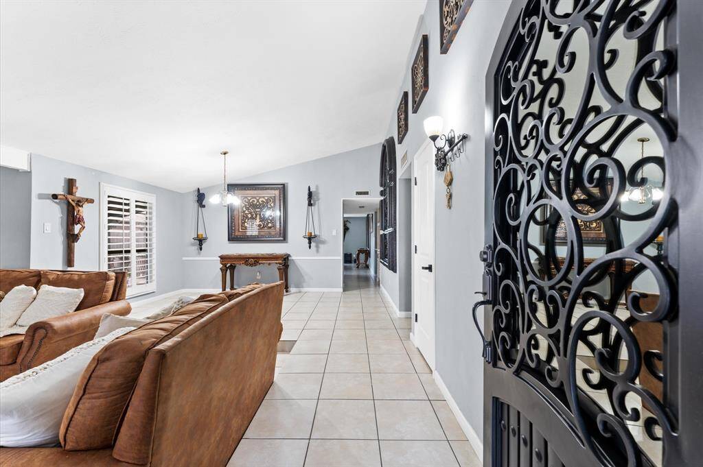 The home boasts upgraded windows, new doors, and fresh paint throughout
