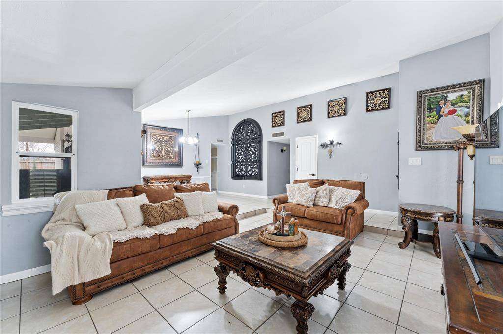 Spacious living area with natural light and fresh paint throughout.