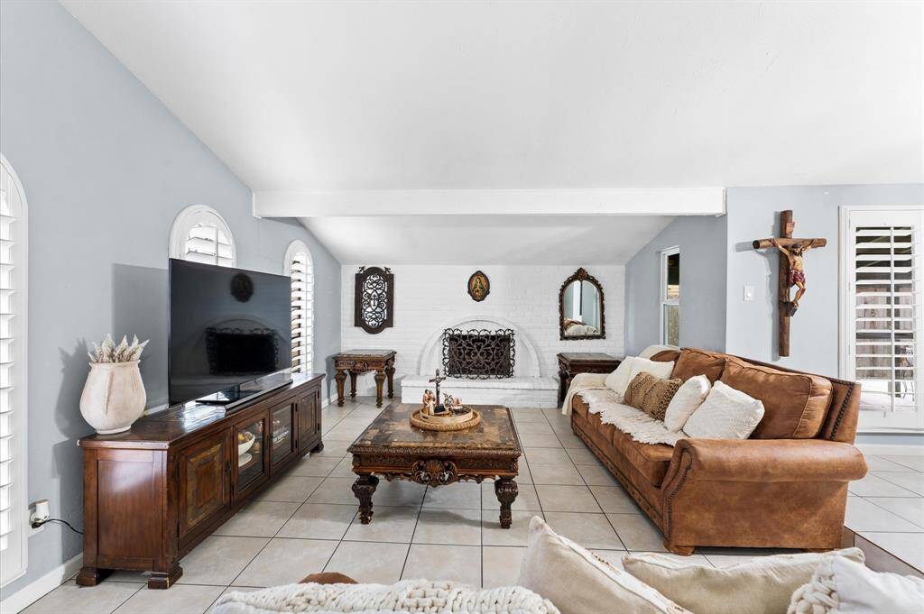 Step inside to an inviting open-concept living space with fresh paint, modern finishes, and no carpet for easy maintenance.