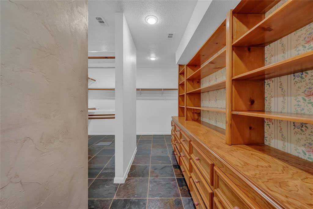 *Huge master closet with extensive Built-Ins.