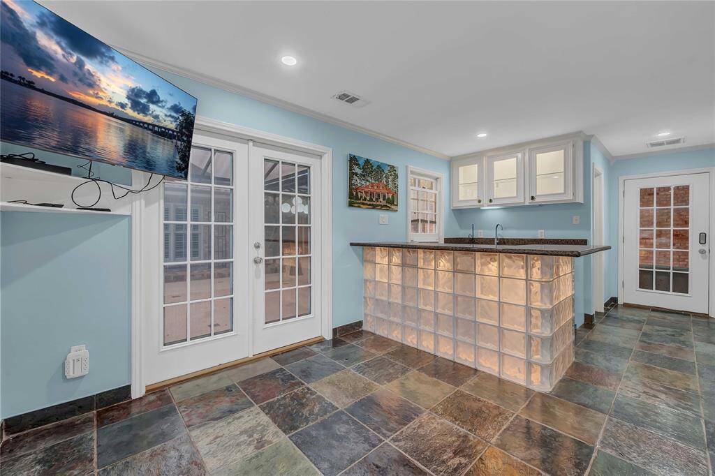 *Cabana comes with granite, refrigerator, raised lighted-bar, picture window to pool, bathroom and French doors to the extended patio area.