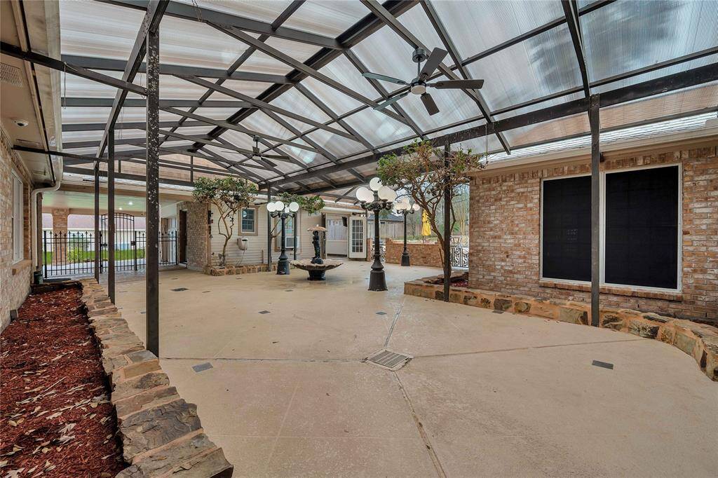 *New ceiling fans with lights on back patio. Note there are French doors into the patio from the bedchambers.