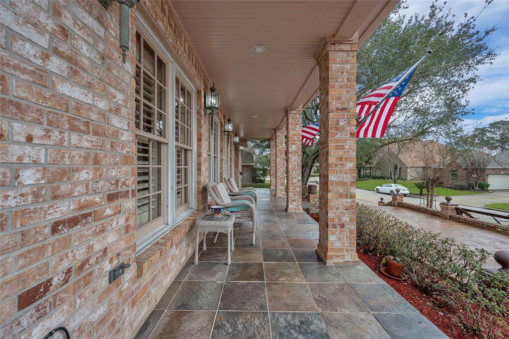*Extensive covered porch is a must see!