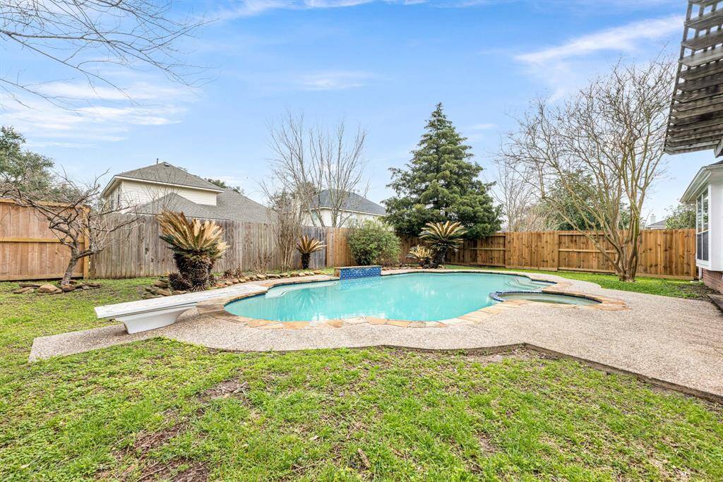 Experience ultimate backyard living with a crystal-clear pool, comfortable shaded seating, and abundant green space. From splashing in the water to sharing stories by the grill, you’ll find countless ways to make this outdoor haven your own.