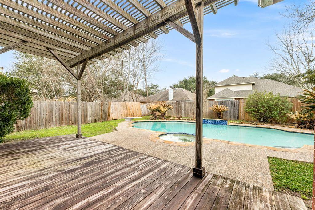 Discover your personal paradise in this spacious backyard, complete with a refreshing pool, covered lounge area, and ample room for outdoor games. It’s the ideal setting for fun-filled weekends, family gatherings, and endless possibilities under the sun.