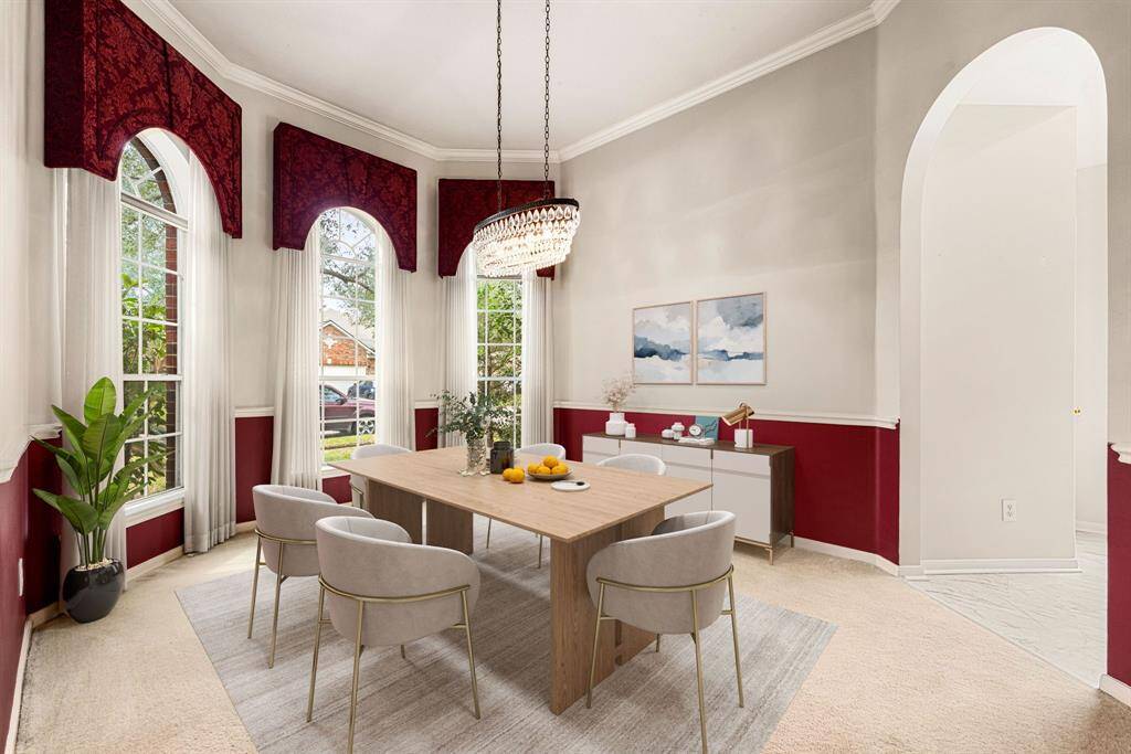 Make memories gathered around the table with your family and friends! This dining room features high ceilings, crown molding, large windows, plush carpet and a beautiful chandelier. *Virtually Staged
