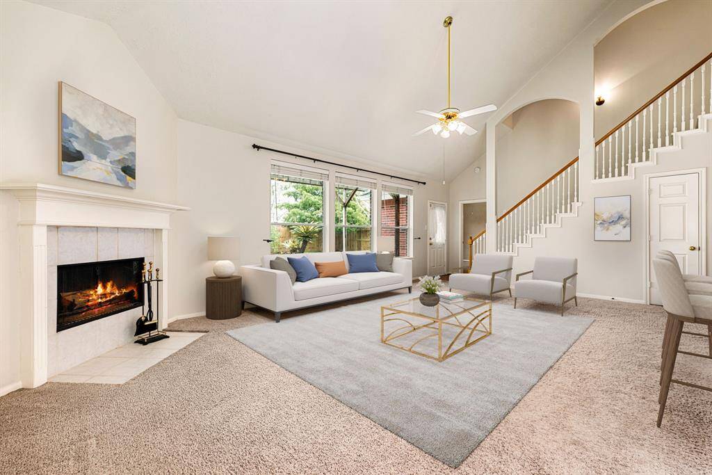 Gather the family and guests together in your lovely living room! Featuring soaring high ceilings, recessed lighting, dark stained ceiling fan, custom paint, large windows that provide plenty of natural lighting throughout the day. *Virtually Staged