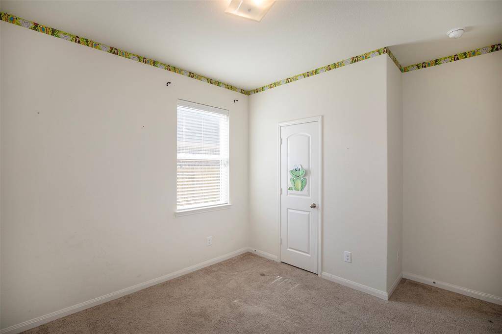 The bedrooms in the home feature carpet flooring.