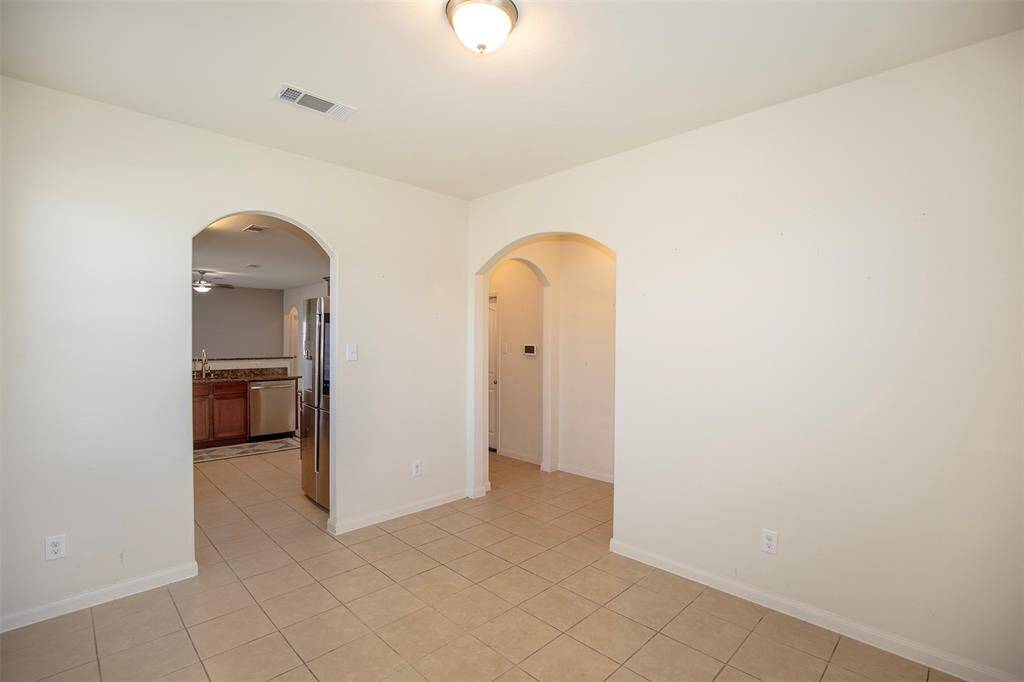 The dining room has easy access to the kitchen.
