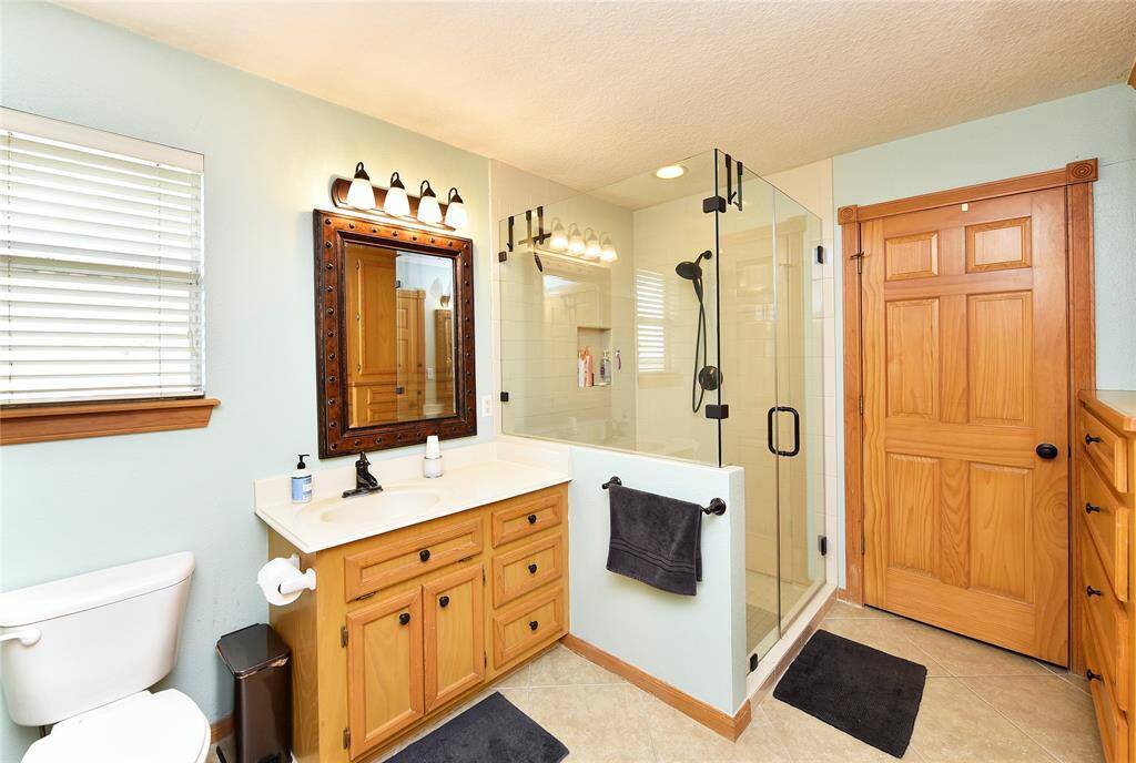 Two spacious walk-in closets offer abundant storage.