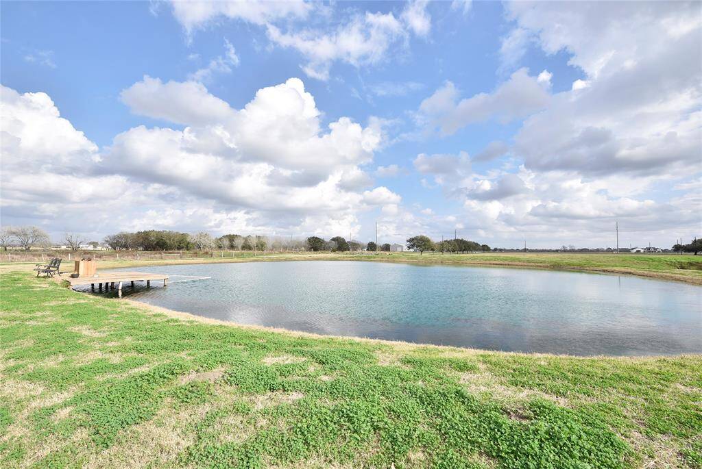 Tranquil pond, perfect for fishing and relaxation.