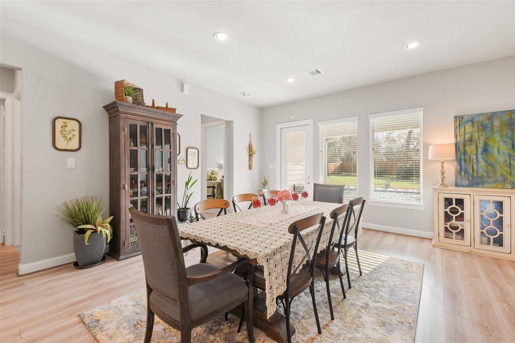Stainless appliances. Open to Dining and Living Room.