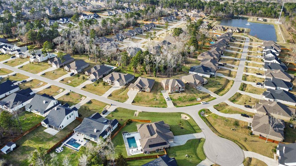 The driveway and the garages leave plenty of room for plenty of vehicles.
